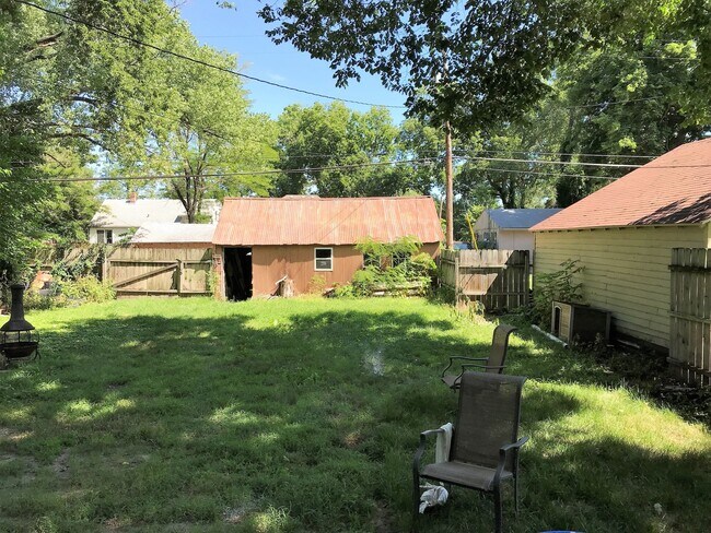 Building Photo - Fenced-in Yard + Washer & Dryer Included +...