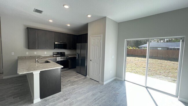 Building Photo - Stunning Upgraded 3 Bedroom / 2 Bathroom Home in Palm Bay!