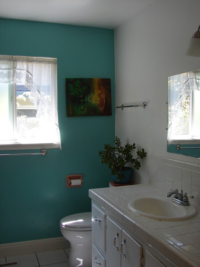 white tile in bathroom - 404 Hill St