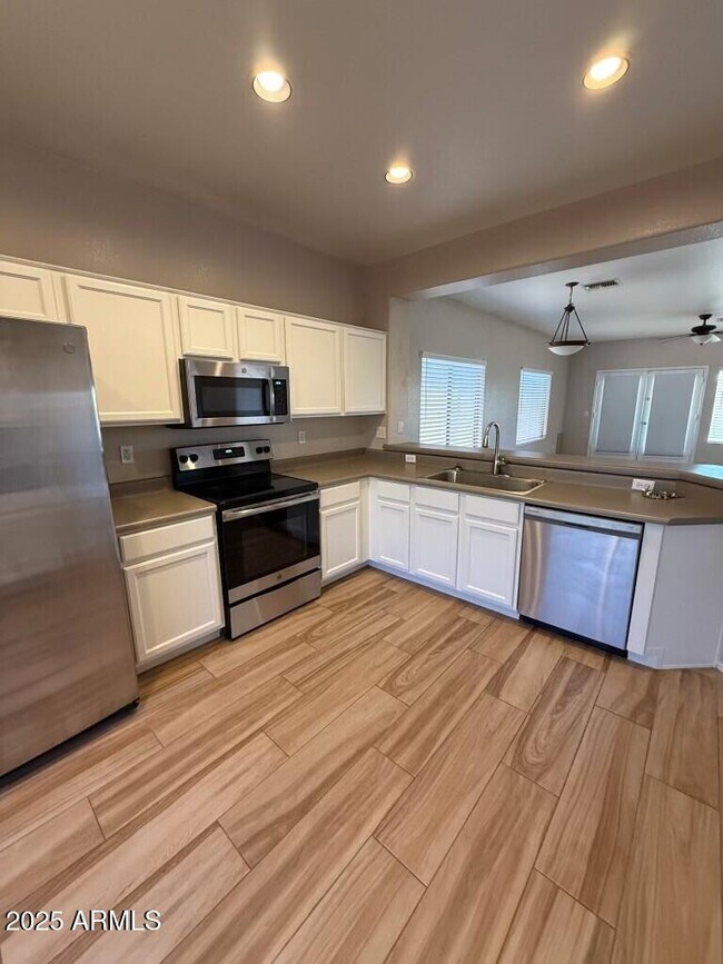 Building Photo - 6511 W Range Mule Dr