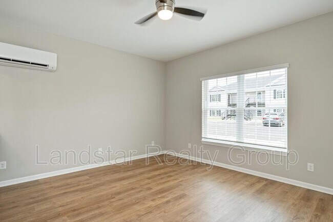 Building Photo - 7302 Tiger Way 102