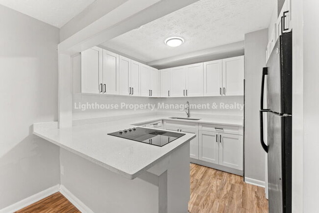 Building Photo - Gorgeous 4/2 Townhome-Brooklynn