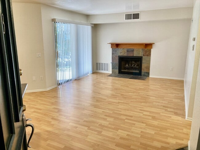 Building Photo - One Bedroom with Garage and IN-Unit laundry in Resort-Style Complex