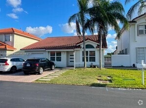 Building Photo - 10570 NW 51st St