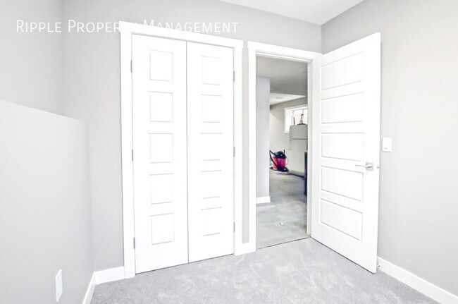 Photo du bâtiment - COZY 2-BED BASEMENT | MODERN COMFORT | MARTINDALE PARK