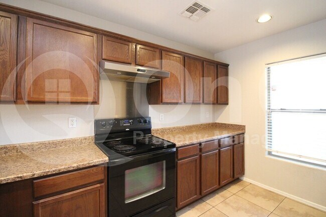 Building Photo - 7644 S 64th Ln