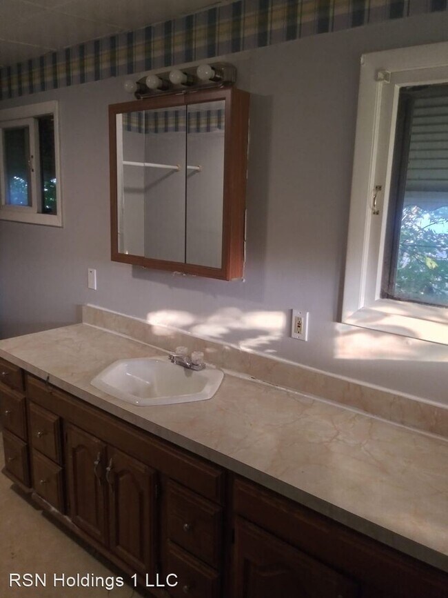 Foto del edificio - 3 br, 1 bath House - 9110 MACOMB AVE