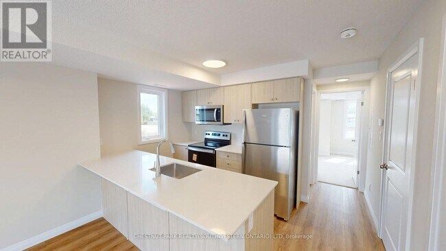 Building Photo - 410-410 Northfield Dr W