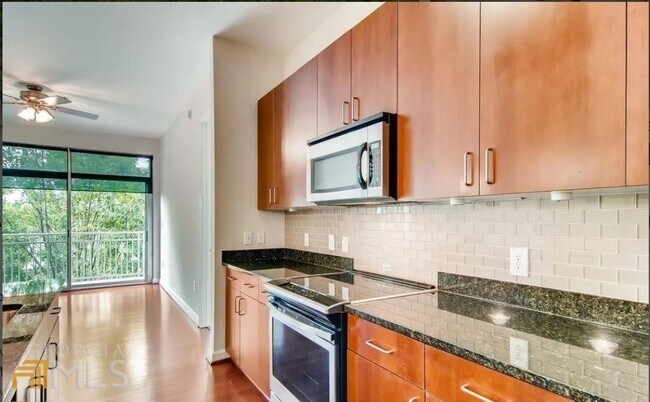 Building Photo - 711 Cosmopolitan Dr NE