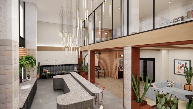 Entretenga a sus invitados en el salón club que cuenta con un espacio de reunión y un área de bar. - Modera Rio Salado