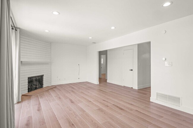 Building Photo - Stylishly Remodeled 4-Bedroom Home in Prim...