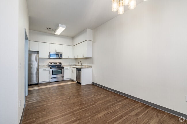 1BR, 1.5BA - 660SF - Living Room - SoEl District Lofts