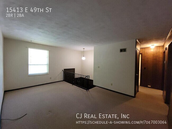 Foto del edificio - 15413 E 49th St
