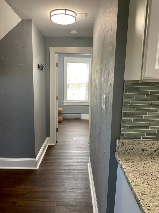 Hallway to second bedroom or another option for eating nook. - 140 Barrows St