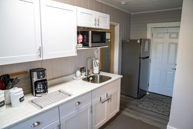 Full kitchen w/all necessities included. - 617 Douglas Ave
