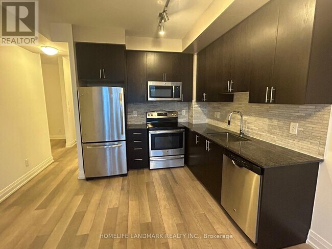 Photo du bâtiment - 7165-7165 Yonge St