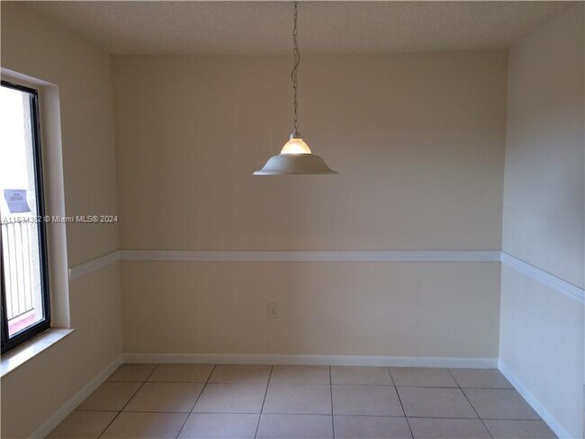 Foto del edificio - 9915 W Okeechobee Rd