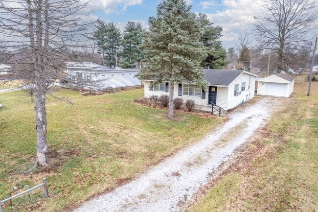 Building Photo - DEPOSIT MOVES YOU IN! No rent due until Ap...