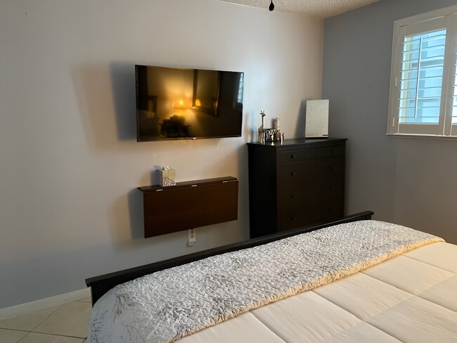 Main bedroom - TV and Dresser - 117 NW 47th Ter