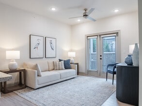 The Palafox: 1BR, 1BA- Living Room - The Flats at Ransley