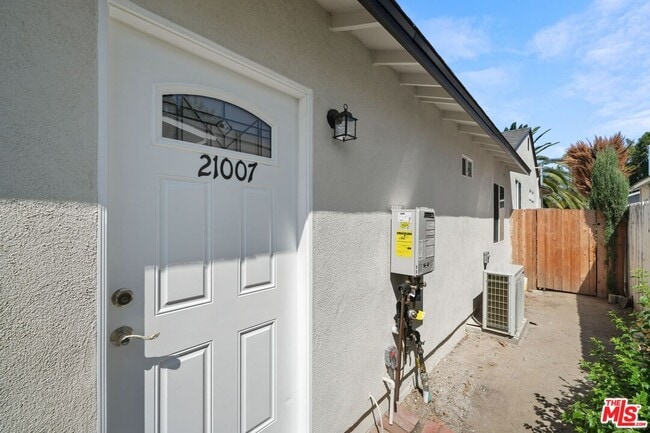 Building Photo - 21007 Saticoy St
