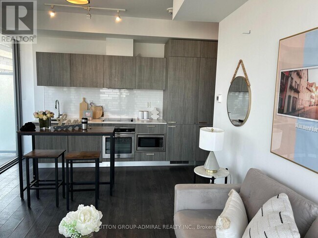 Building Photo - 50 Charles St E