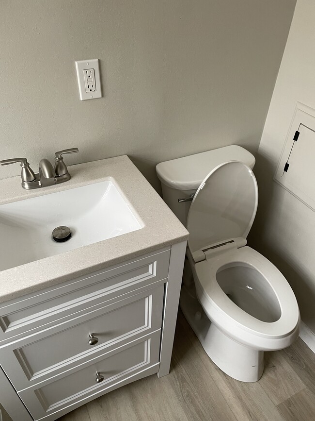 New vanity & toilet - 11090 W Forest Home Ave