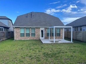 Building Photo - 8711 Windsong Trail Dr