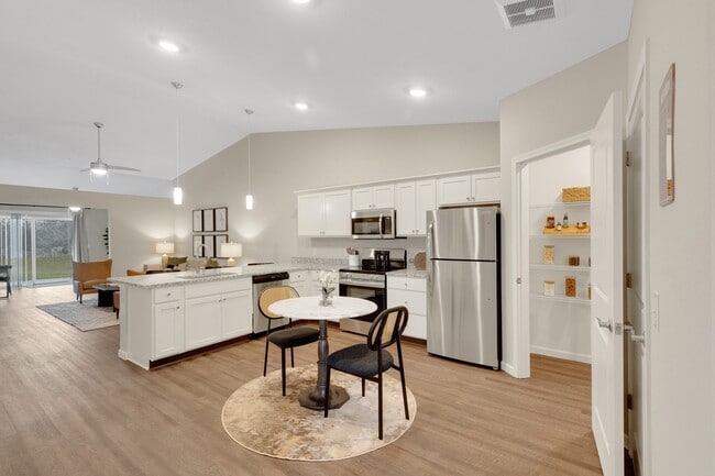 Granite Counters with Stainless Steel Fixtures and Appliances - Redwood Amherst