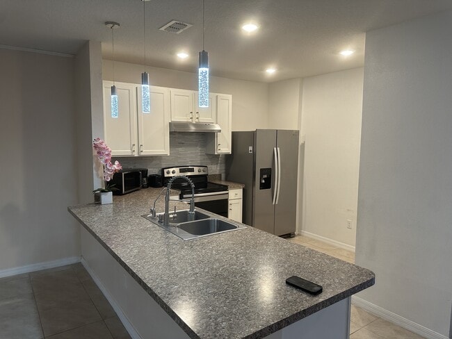 Building Photo - 9006 Pinales Wy