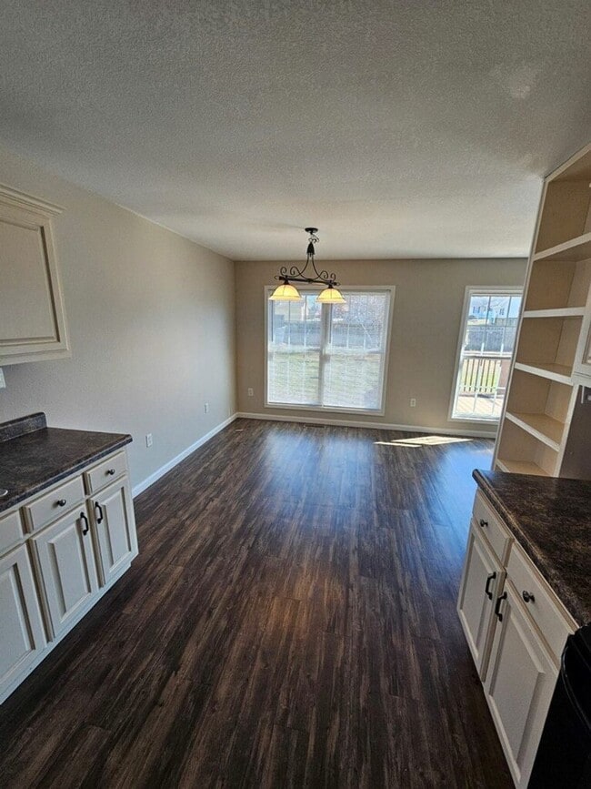 Building Photo - Spacious 3-Bedroom Home in Crossville with 2-Car Garage, Fenced Yard & Porches