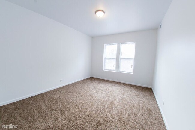 Foto del edificio - 2 br, 1 bath Apartment - 1101 N Lawler Ave