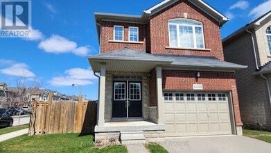 Building Photo - 2430 Whistling Springs Crescent