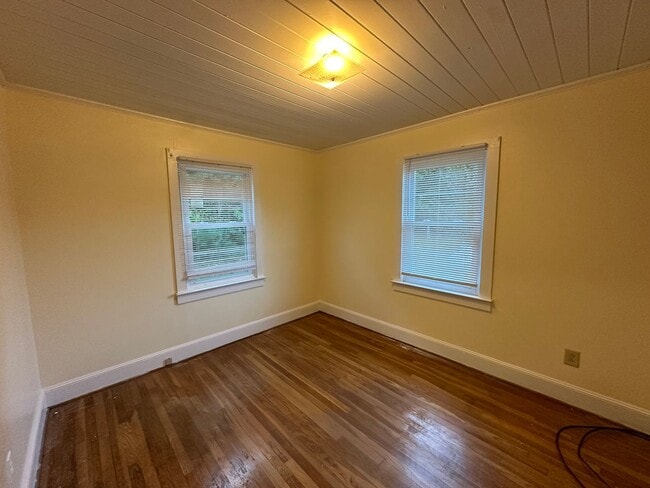 Building Photo - Your Slice of Serenity : Country Charm Awa...