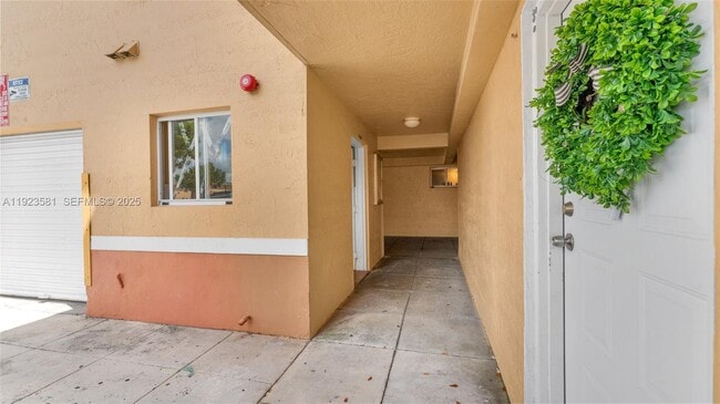 Building Photo - 7935 W 30th Ct