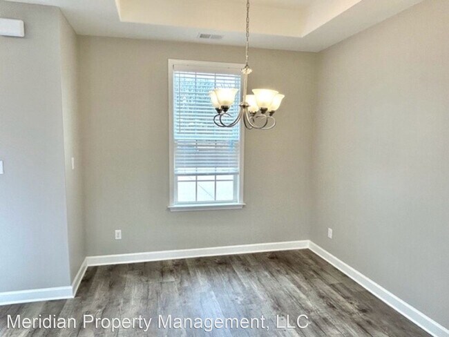 Building Photo - 4 br, 2.5 bath House - 5833 Tucker Landing