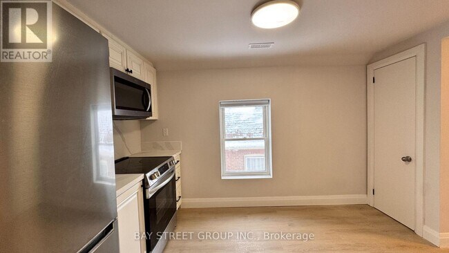 Building Photo - 5731 Stanley Ave