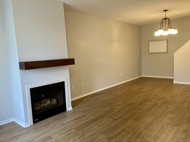 New LVP flooring throughout main level - 1236 Crystal Pl E