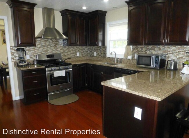 Foto del edificio - 4 br, 2.5 bath House - 3387 Putnam St