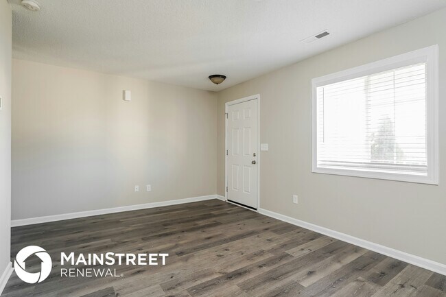 Foto del edificio - 5504 Carriage Woods Dr