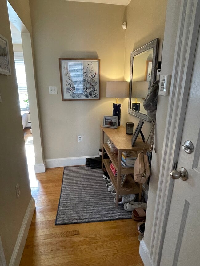 Mud room/entry way creating separation between living room and main entrance - 34 F St