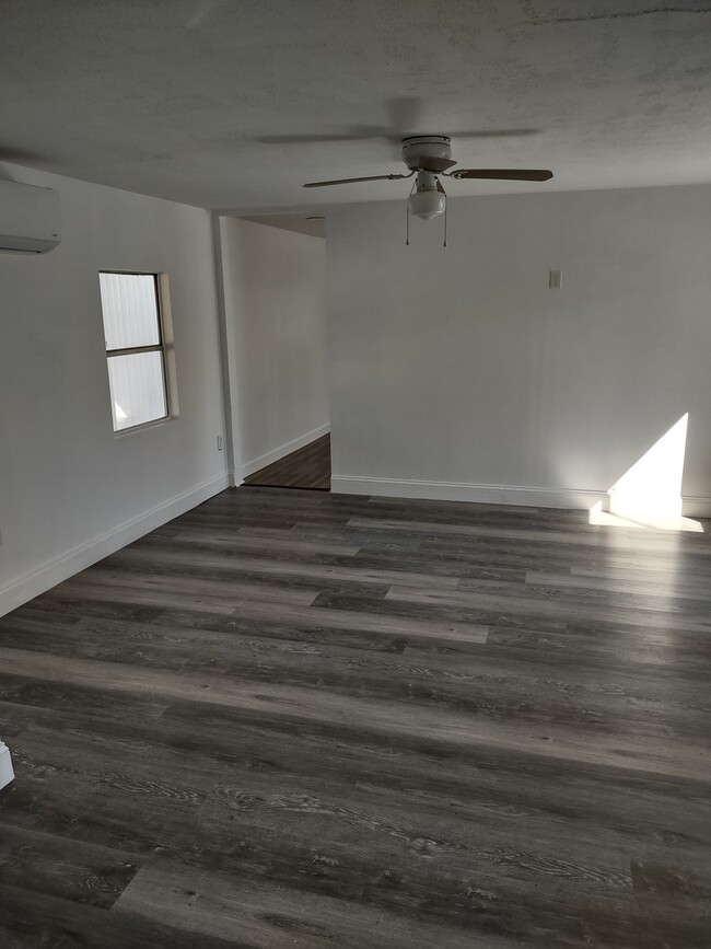 NEW VINYL PLANKING - 7402 Demure Ln
