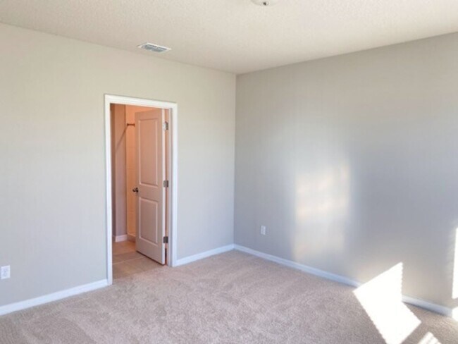 Building Photo - Beautiful Brand New 4 bedroom, 2 1/2 bath ...