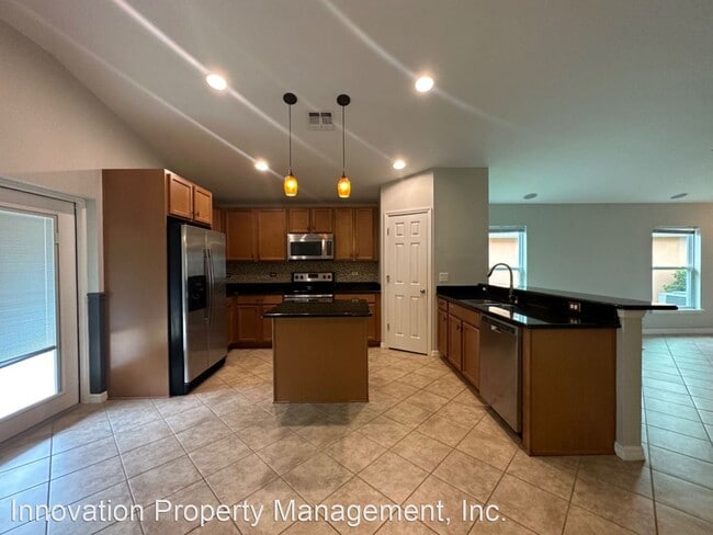 Building Photo - 4 br, 2 bath House - 15643 Carina Dr