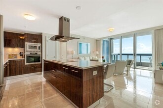 Building Photo - 6899 Collins Ave