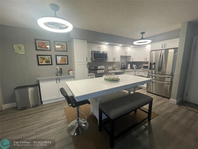 Building Photo - 9772 N Belfort Cir