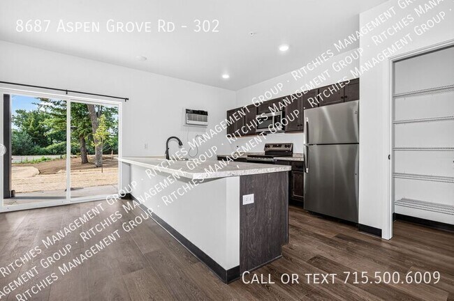 Building Photo - 8687 Aspen Ln