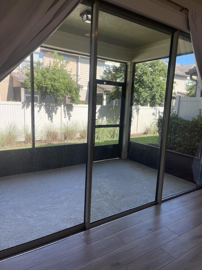 Building Photo - 3/2.5 updated townhome in gated community with 2 car garage