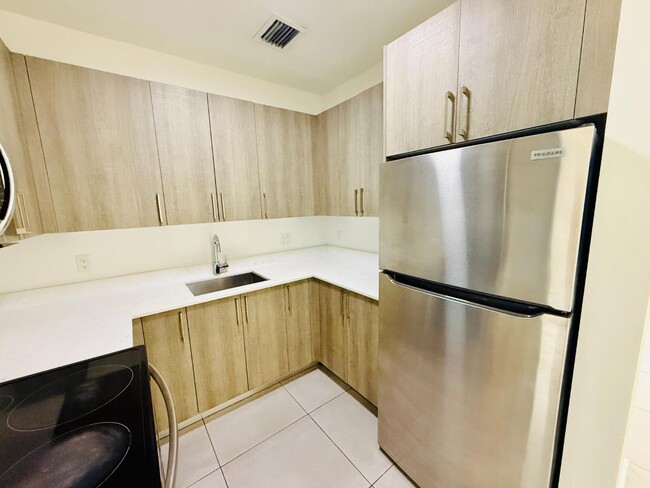 Building Photo - 1295 W 69th St