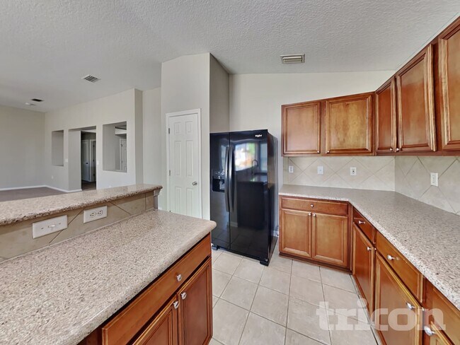 Foto del edificio - 11238 Justin Oaks Dr N